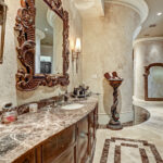 Custom marble vanities in master bath.